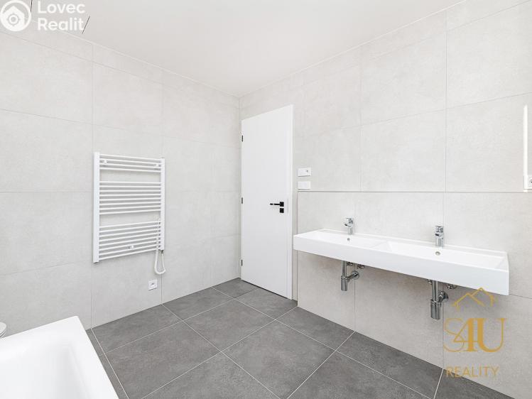 Prodej rodinného domu Květnice, Kostivalová 747 č. 27