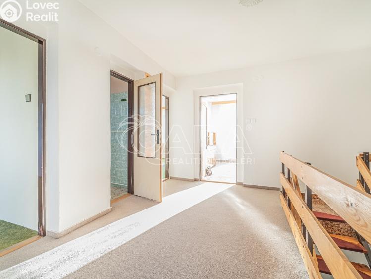 Prodej rodinného domu Roztoky, Lidická 1540 č. 13