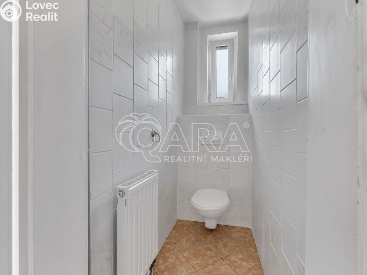 Prodej rodinného domu Postoloprty, Palackého 432 č. 17