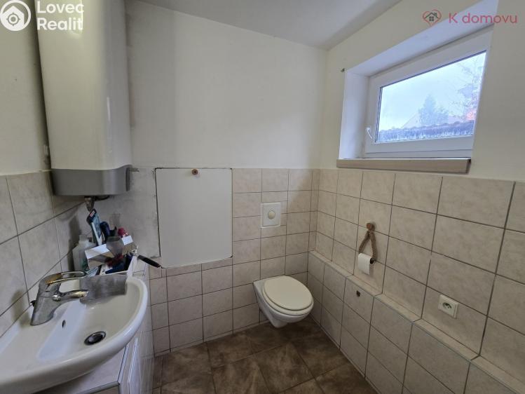 Prodej rodinného domu Domaželice č. 9