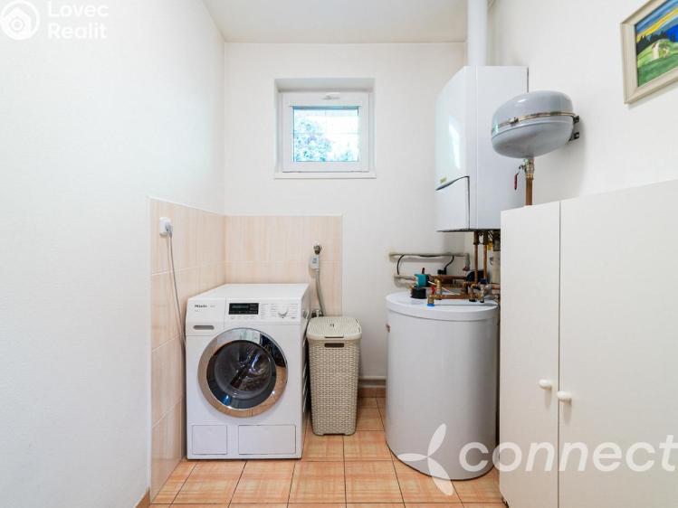 Prodej rodinného domu Jesenice, Karafiátová 424 č. 10