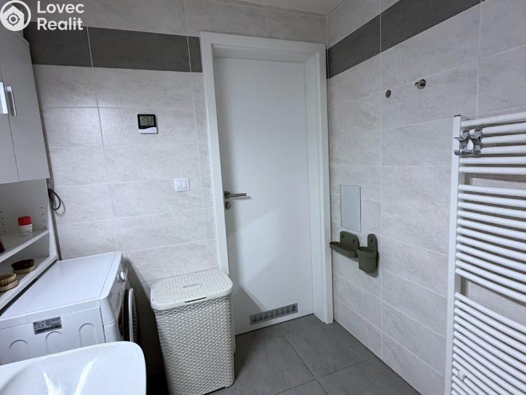 Sale apartment 2+KK Praha, Tupolevova 893/16 č. 15