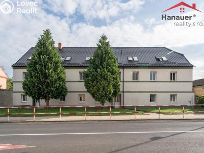 Prodej komerční nemovitosti Hostomice, Školní náměstí 22 č. 21