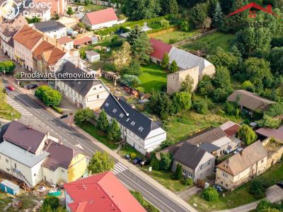 Prodej komerční nemovitosti Hostomice, Školní náměstí 22 č. 18