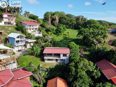 Prodej rodinného domu Coxen Hole,Honduras č. 1